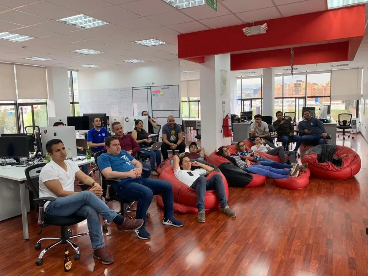Dev team working at the office in Latin America